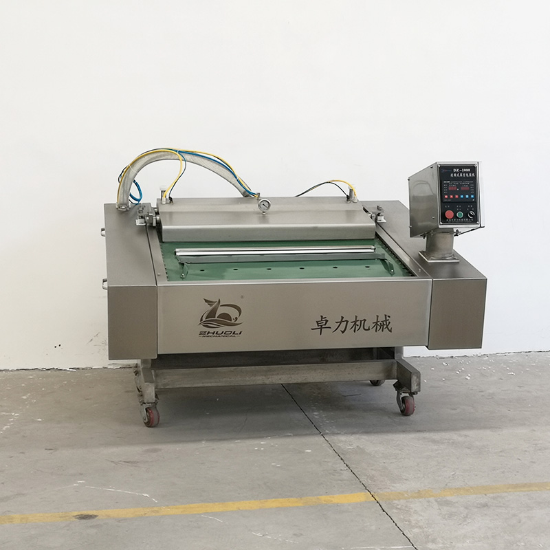 連續(xù)滾動式真空包裝機